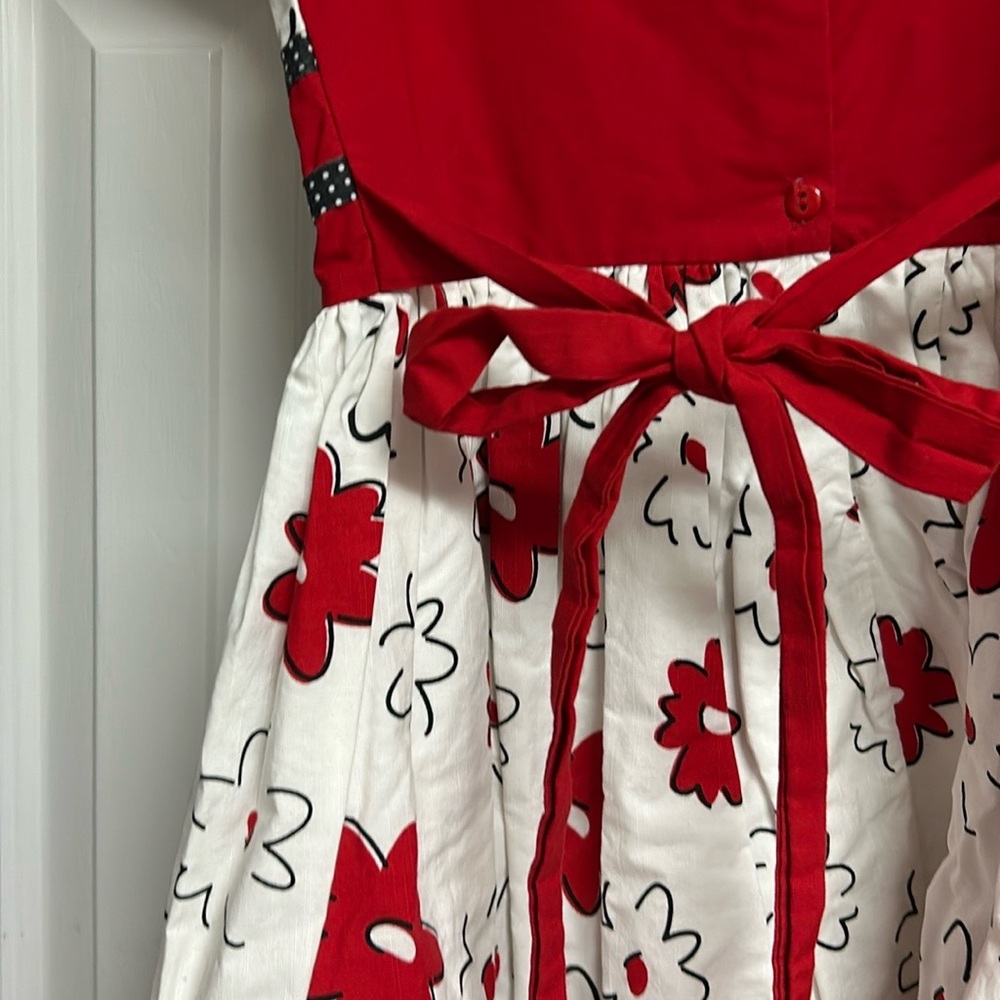 Beautiful girl’s dress with lining on the skirt to look like a princess